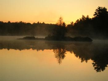 Sunrise and mist on David Lake