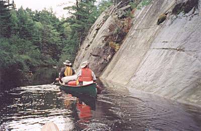 Paddling near a rock face on Kirk Creek